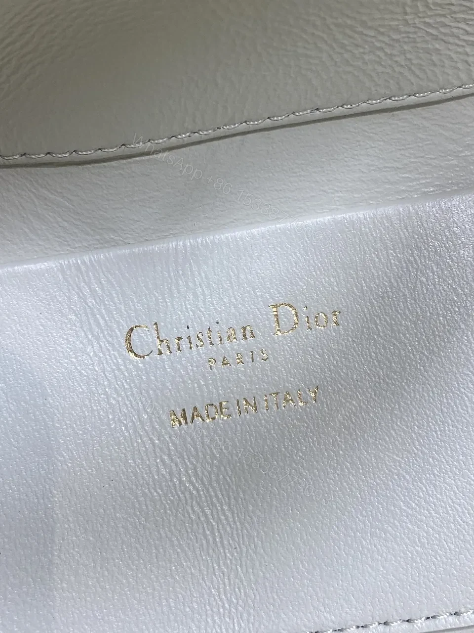 View 3 of Quilted Mini Handbag with Gold Charm - Compact Luxury Bag
