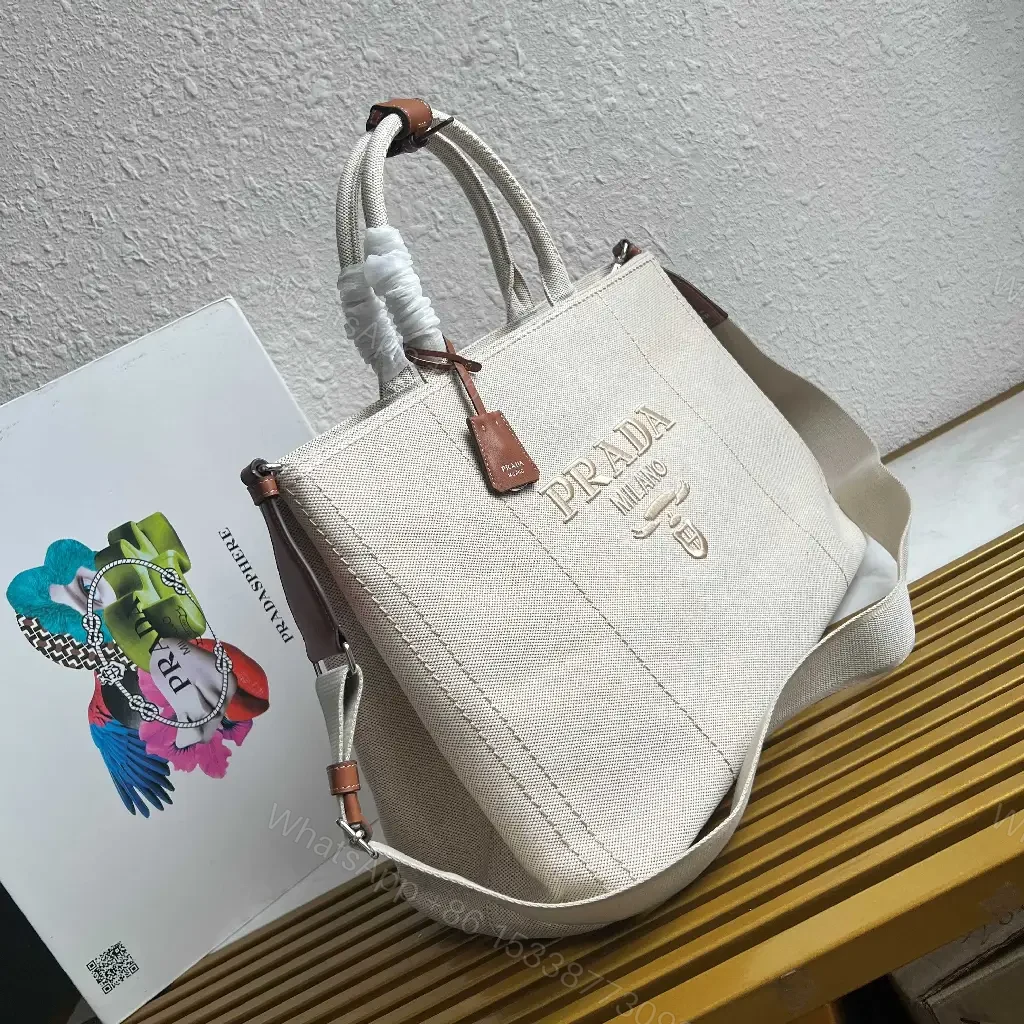 View 5 of Light Beige Canvas Tote Bag with Leather Accents and Structured Silhouette