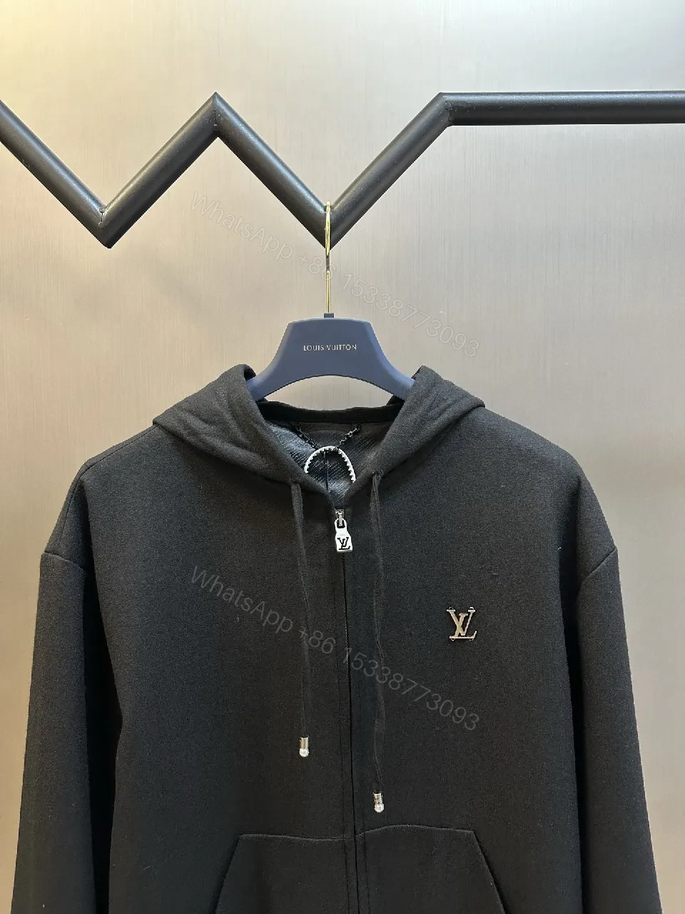 View 2 of Black Leatherette Minimal Zip Hoodie with LV Emblem