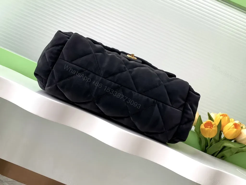 View 6 of Chic Quilted Black Bag with Gold Chain Detail - Compact Luxury