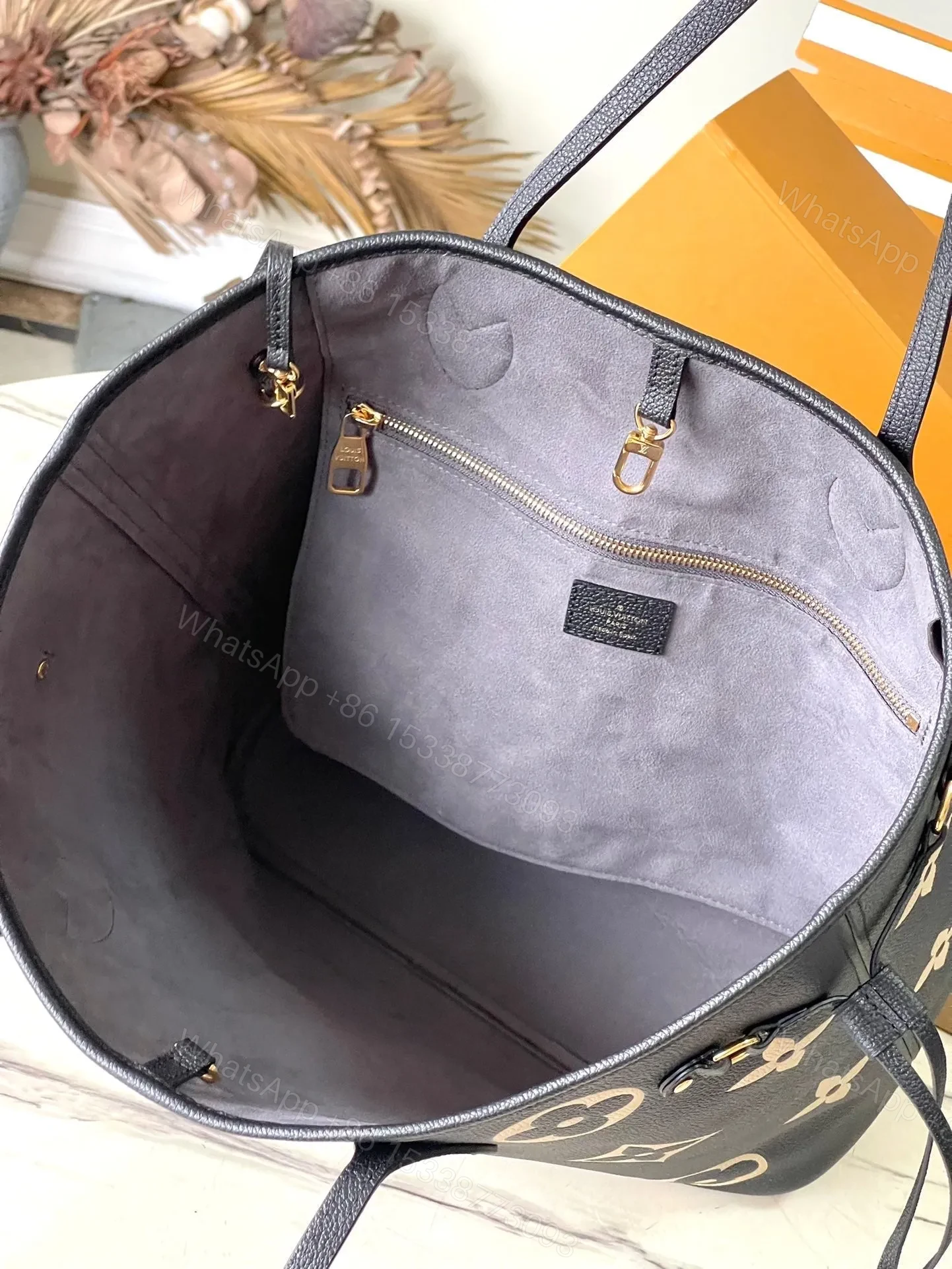 View 2 of LV NEVERFULL MM IN BLACK CREAM MONOGRAM EMPREINTE LEATHER