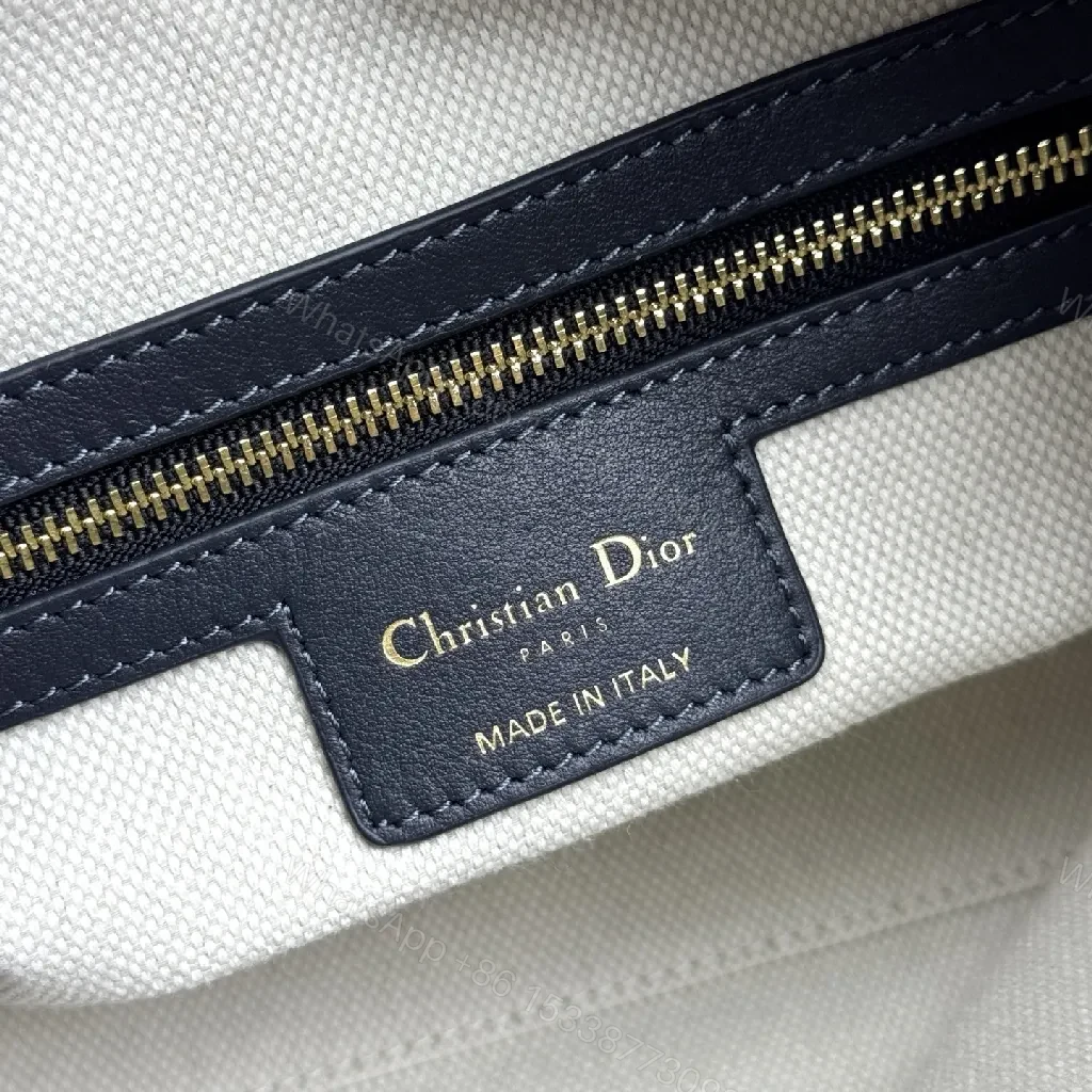 View 2 of Monogram Textured Bucket Bag: Black Leather Trim, Gold Hardware, Medium