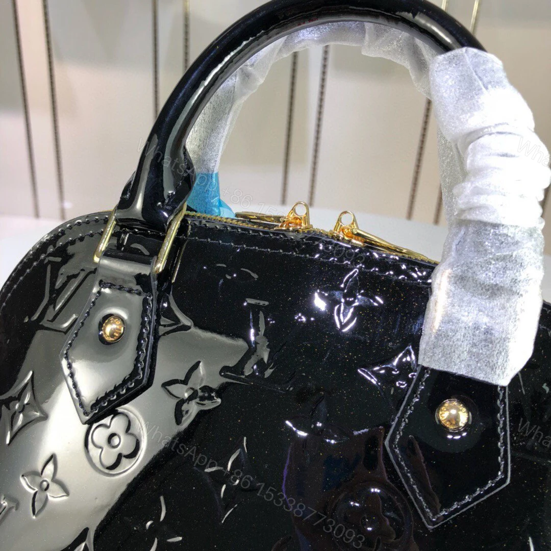 View 14 of Louis Vuitton Alma