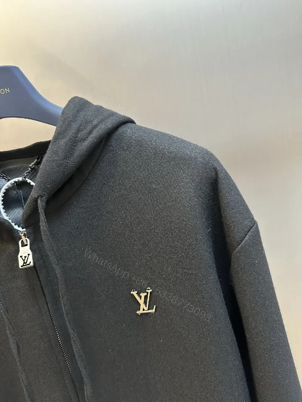 View 4 of Black Leatherette Minimal Zip Hoodie with LV Emblem