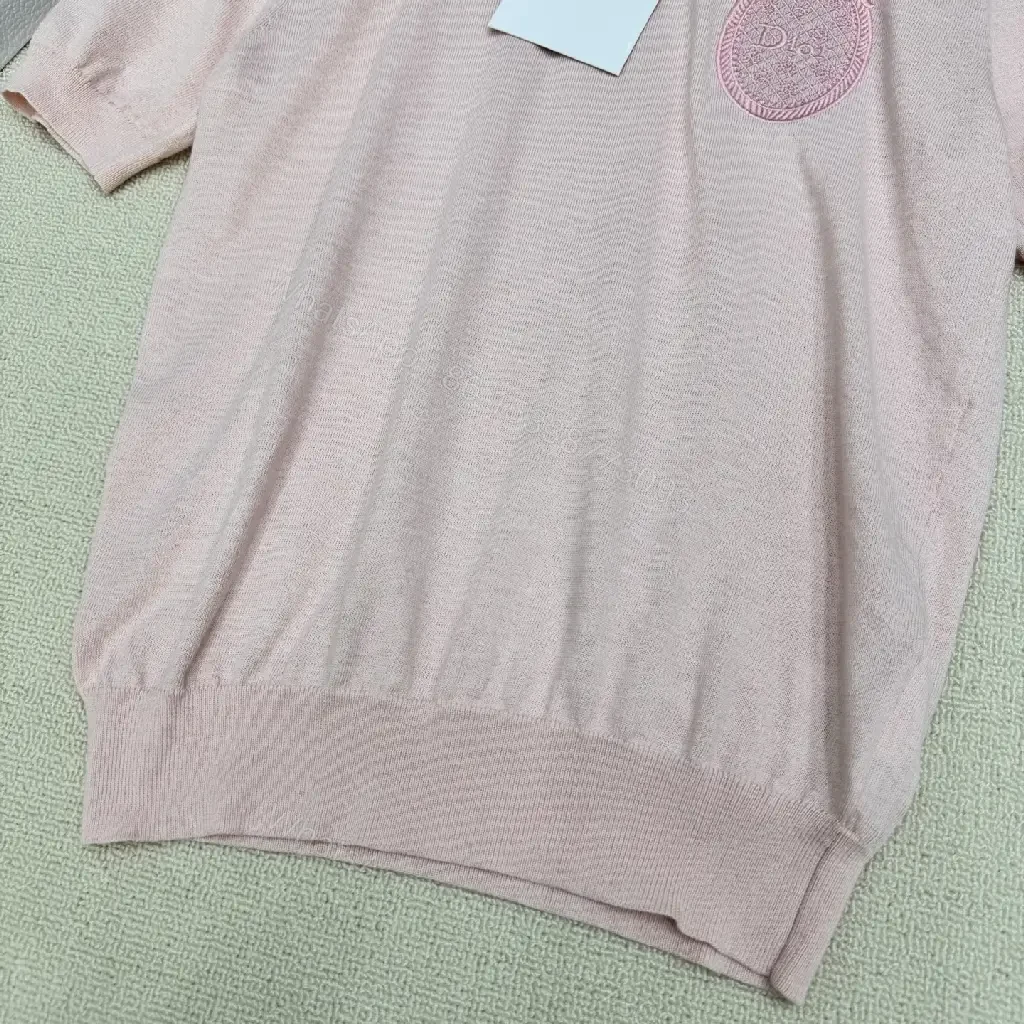 View 3 of Soft Pink Knit Top with Crest – Elegant Everyday Essential