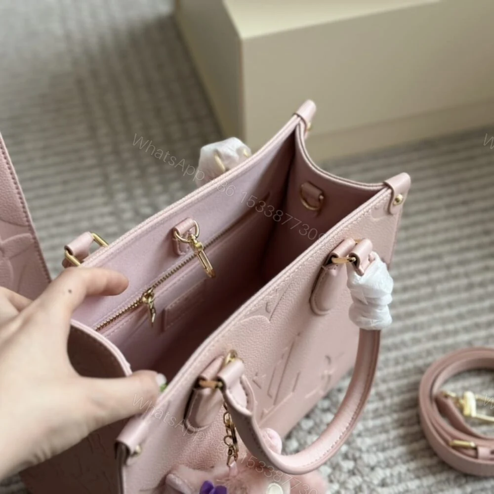 View 6 of Louis Vuitton Onthego PM Monogram Empreinte Pink Opale 25Cm M47135