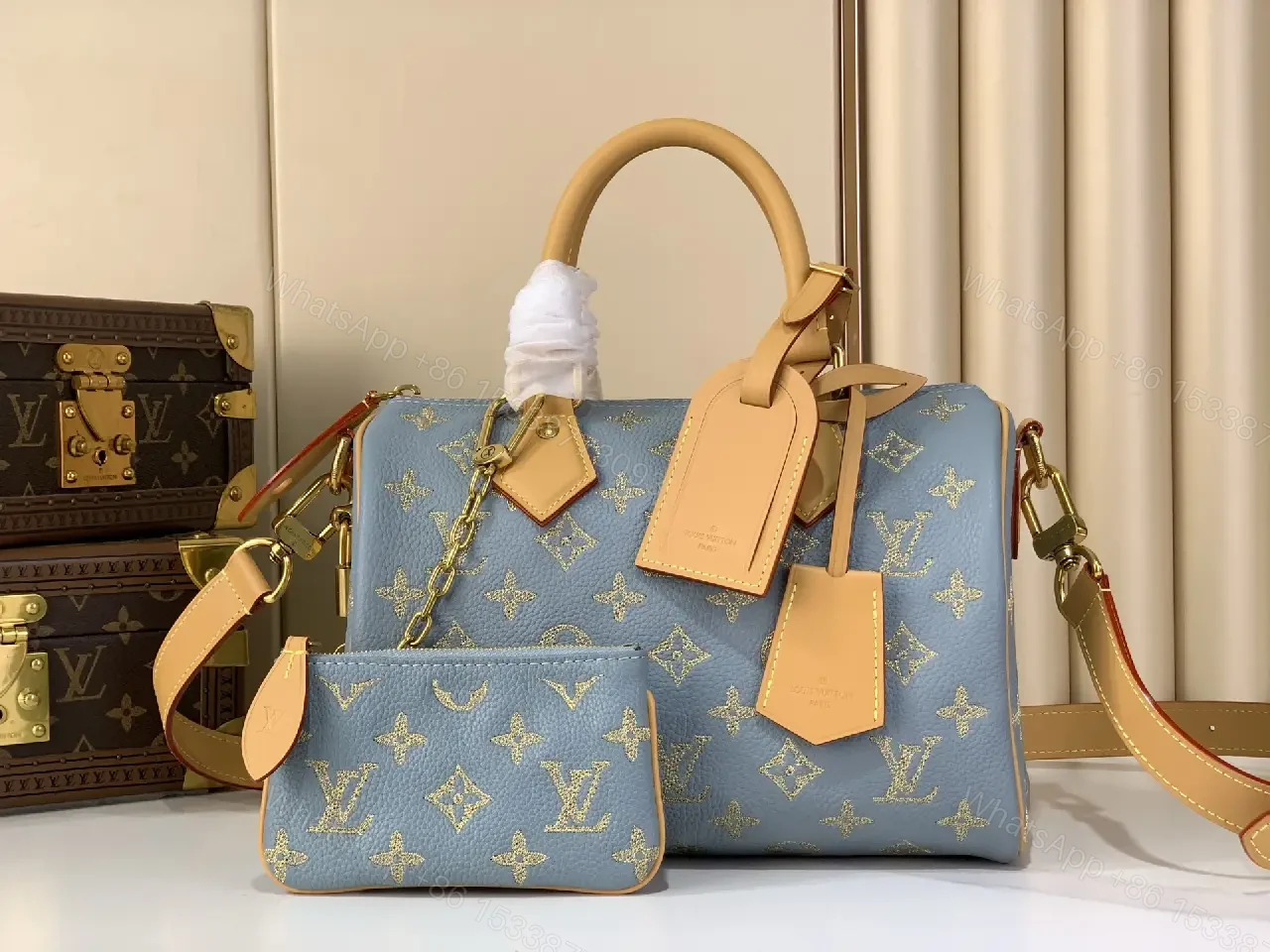 View 2 of Light Blue LV Monogram Tote Bag with Tan Leather Accents