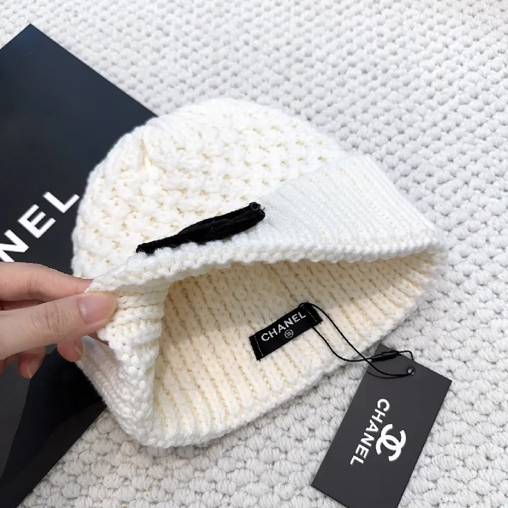 View 6 of Knit Beanie: Luxe Texture, Signature Emblem, Couture-Inspired
