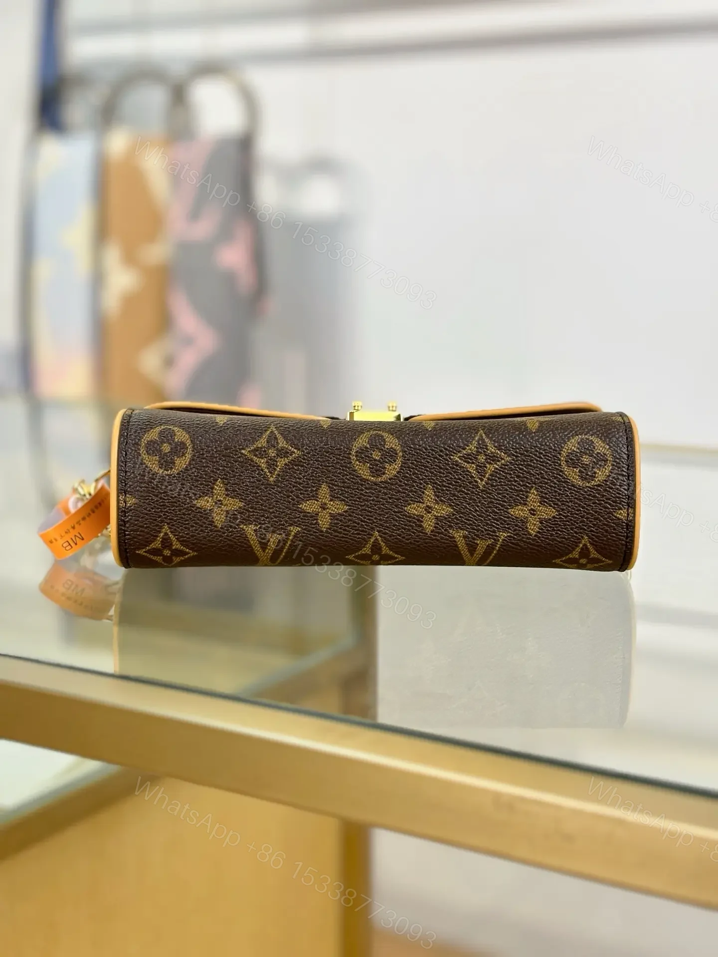 View 6 of Louis Vuitton Monogram Pochette Camille in monogram canvas