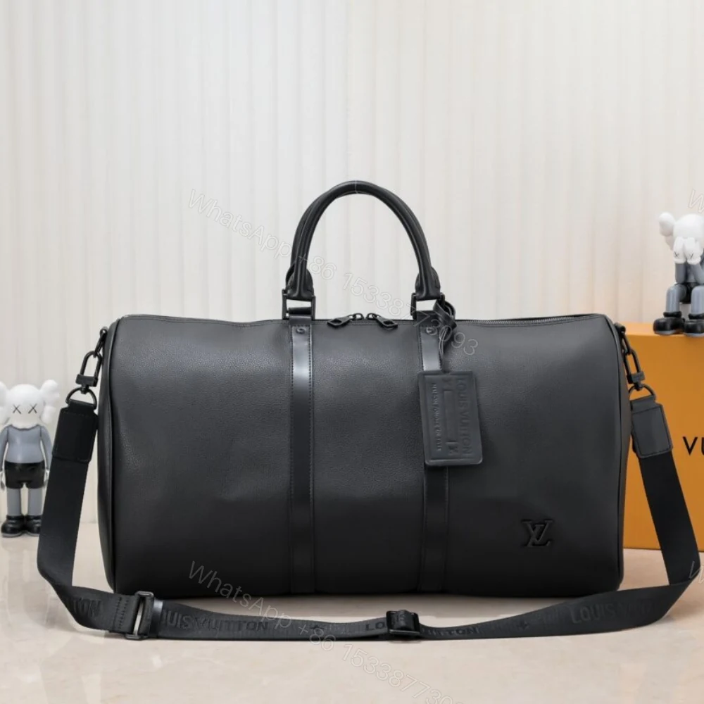 View 2 of Louis Vuitton Keepall Bandoulière 50 Black M21420