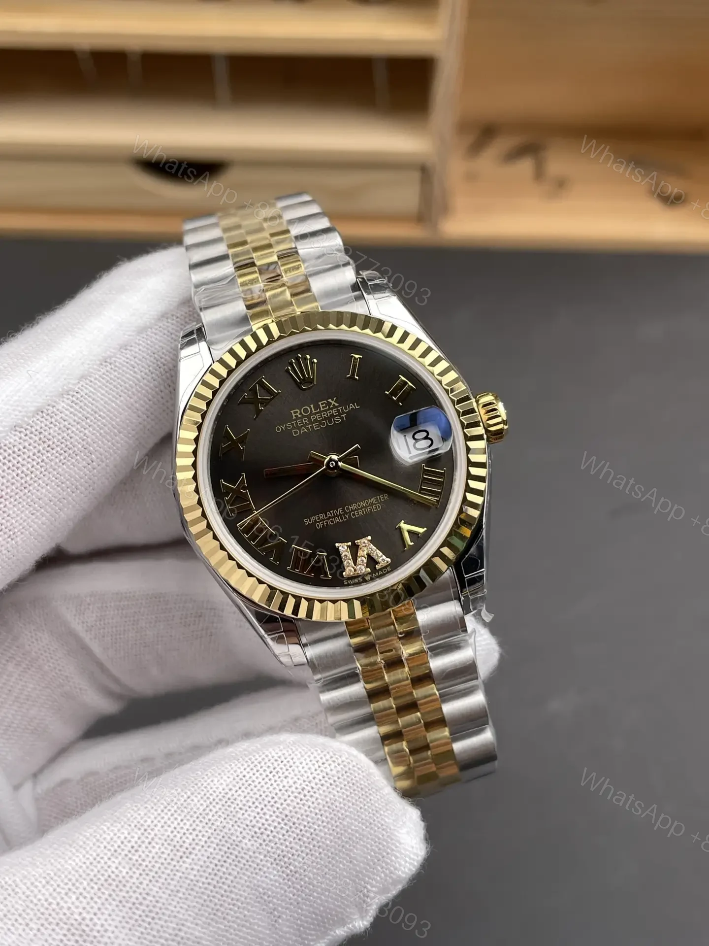 View 2 of Rolex Datejust 31 Stainless Steel Yellow Gold Fluted Grey – Roman Jubilee 278273-0018