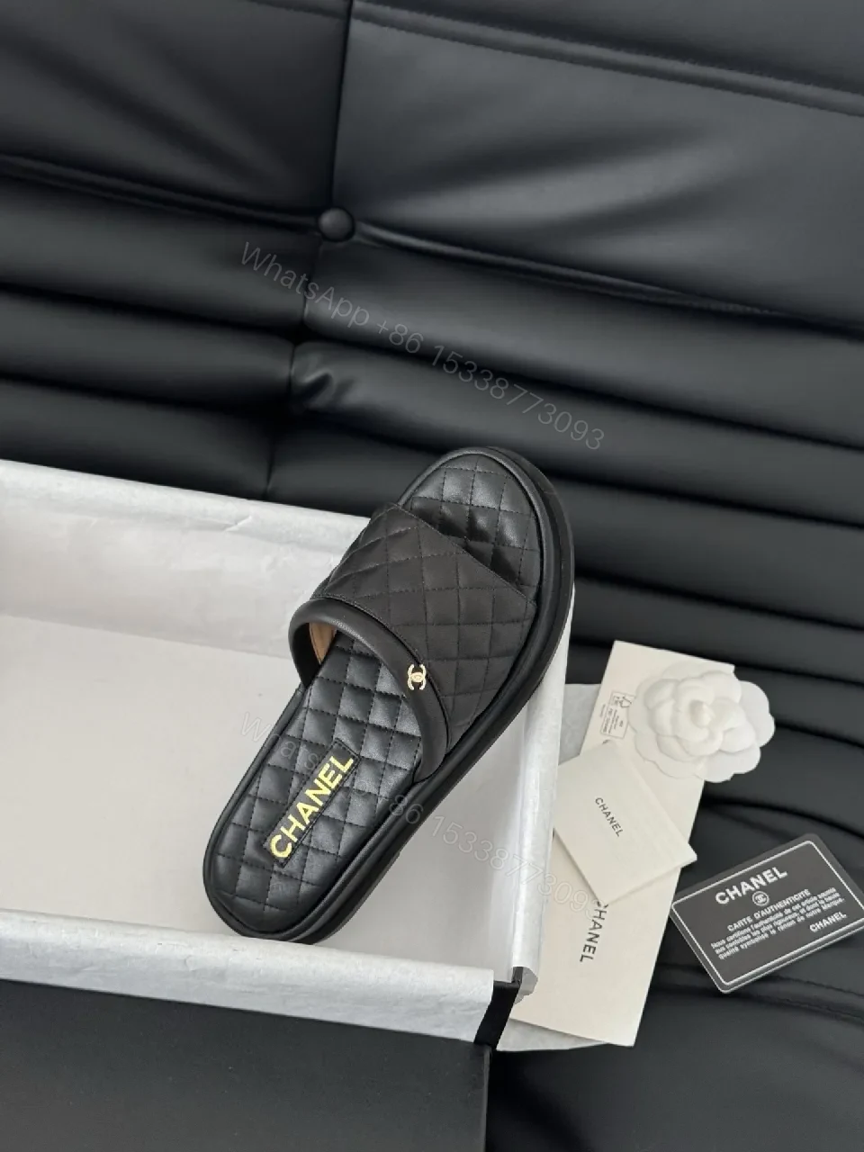 View 2 of Quilted Black Slip-Ons with Gold Logo - Luxe Comfort Shoes