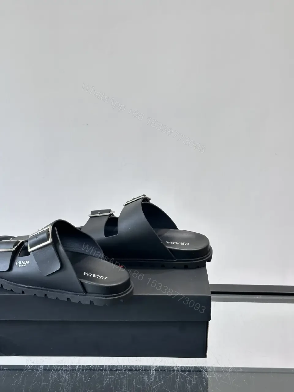 View 2 of Black Leather Double-Buckle Sandals — Prada Style Sliders