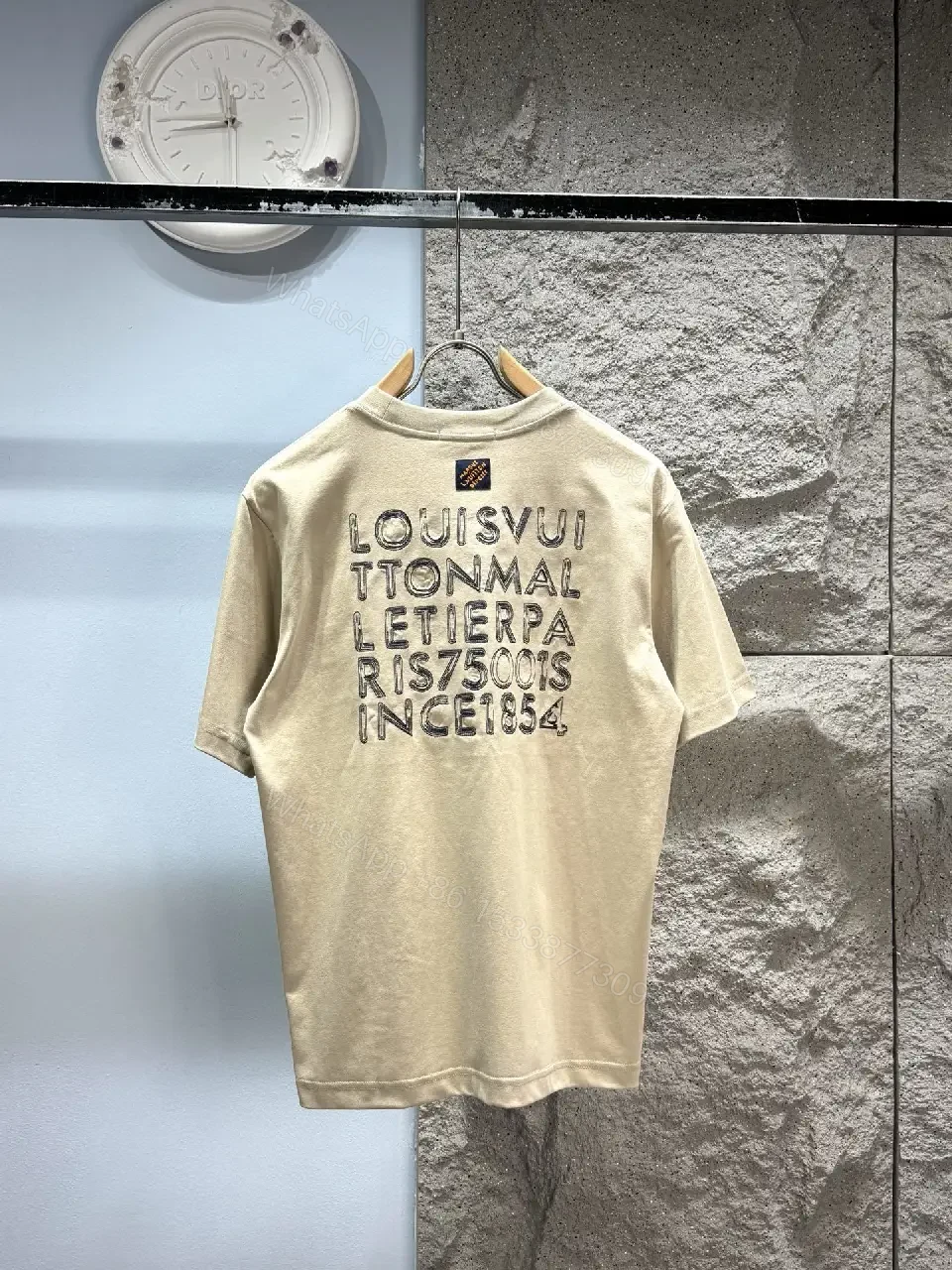 View 3 of Neutral Beige Luxe Tee: Soft Knit, Subtle LVM Monogram, Modern Fit