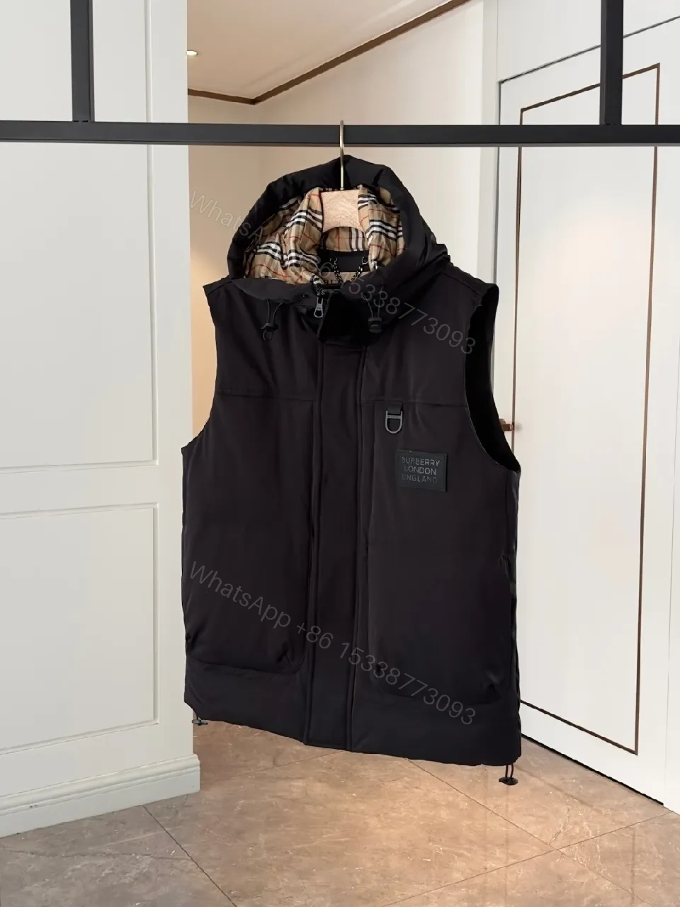 View 7 of Bold Puffer Vest with Plaid Lining — Structured Warmth, Modern Utility