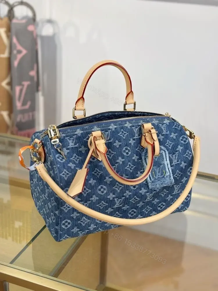 View 5 of Louis Vuitton Monogram Denim Speedy Soft 30 bag