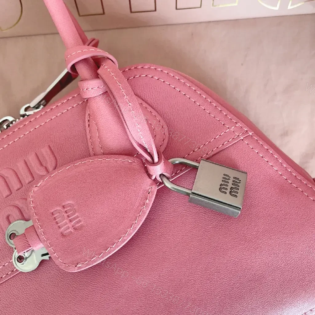 View 8 of Light Pink Leather Dome Satchel: Top-Handle Bag with Shoulder Strap