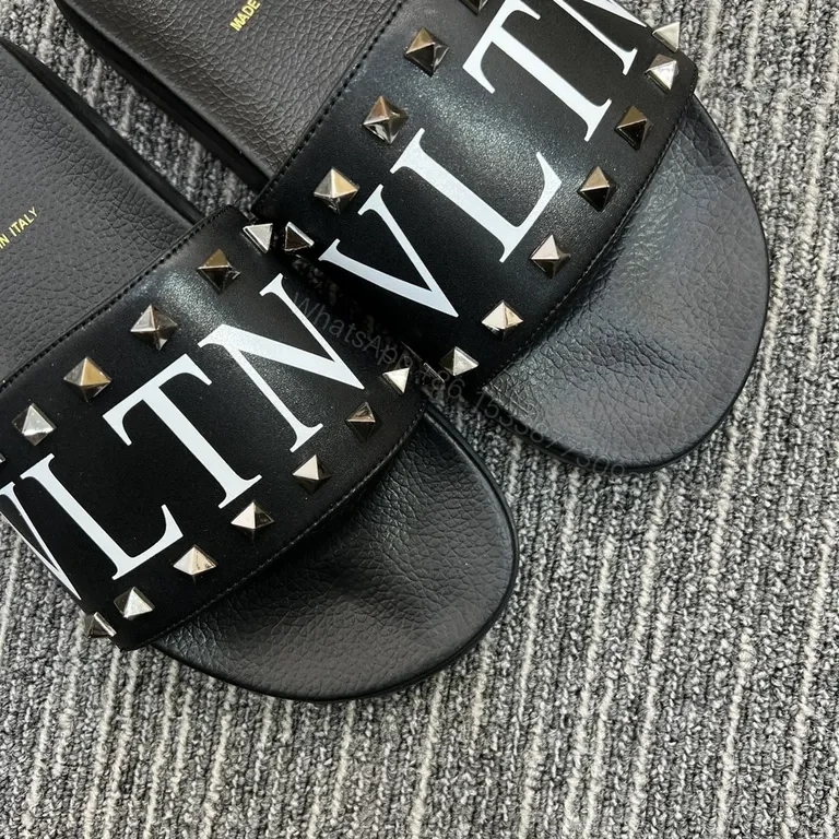 View 5 of Valentino Rockstud Leather Slides â€“ Black, Cushioned comfort