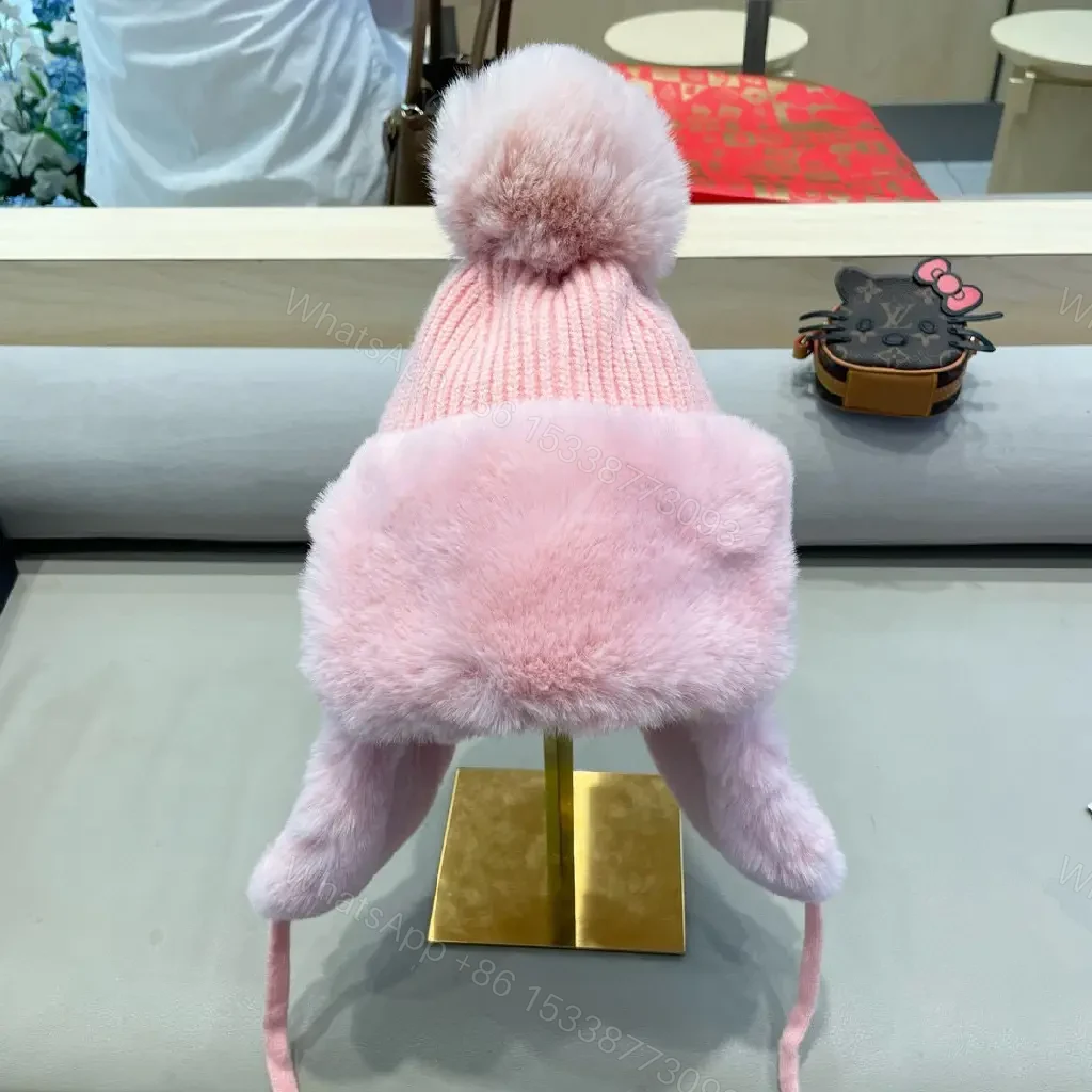 View 7 of Pink Knit Hat with Fuzzy Ear Flaps — Plush Warmth, Luxe Style