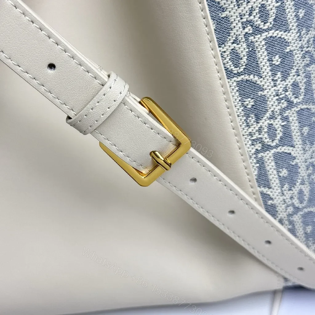 View 6 of Cream Leather & Denim-Inspired Bucket Bag, Structured Luxury