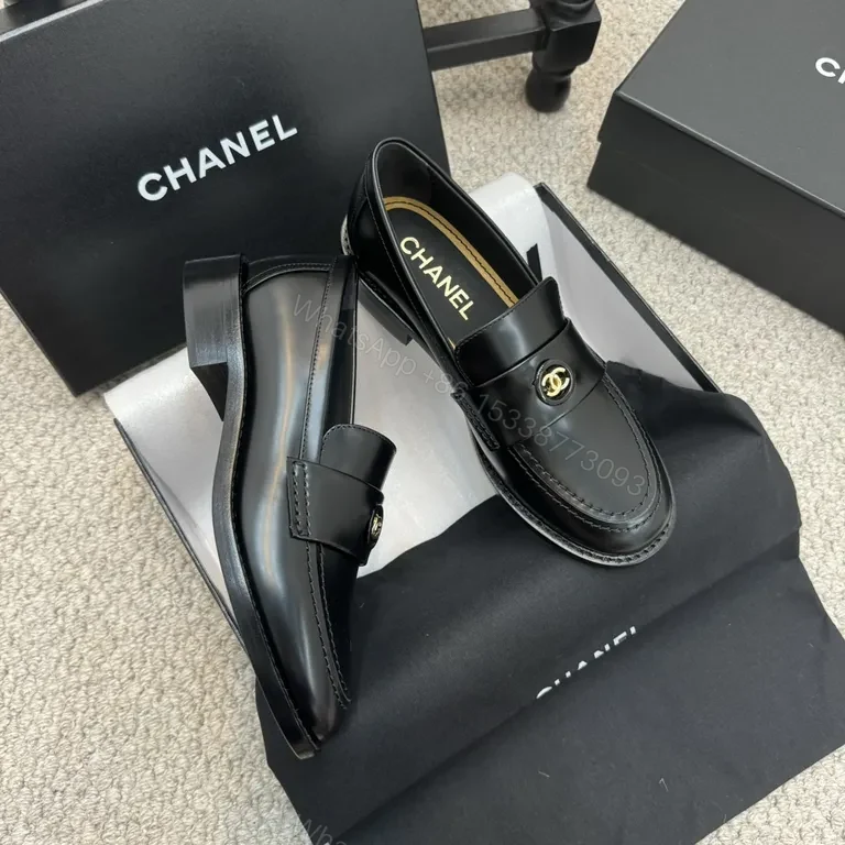 View 5 of Refined Black Leather Loafers with Gold Crest â€“ Luxe Comfort