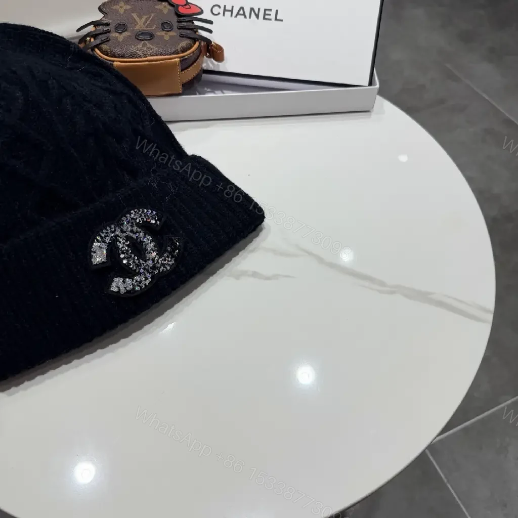 View 6 of Black Knit Beanie with Subtle Crest – Lux, All-Season Comfort