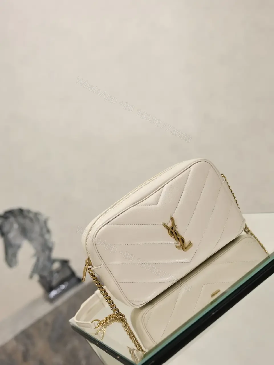 View 10 of Off-White Cream Quilted Chevron Crossbody Bag with Gold Logo