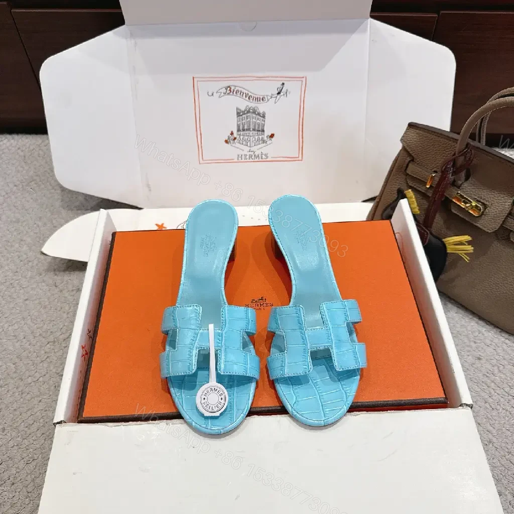 View 8 of Bright Sky Blue Leather Mules with Croc-Texture Strap - Luxury Comfort