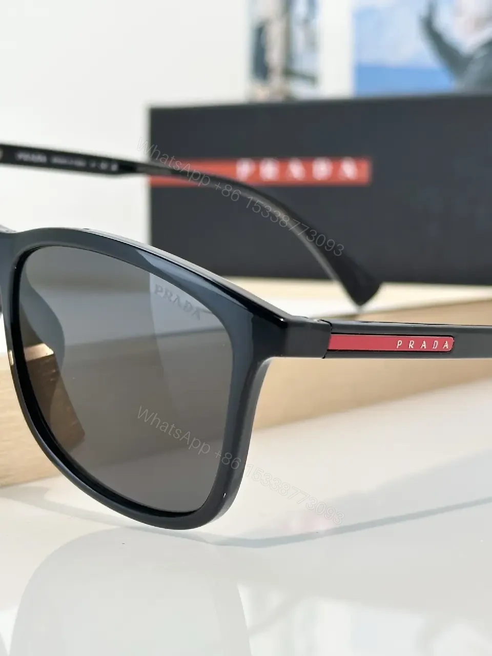 View 2 of Brown Tortoiseshell Sunglasses, Wayfarer-Inspired, Full-Frame, Mottled Pattern, Prada Logo Front