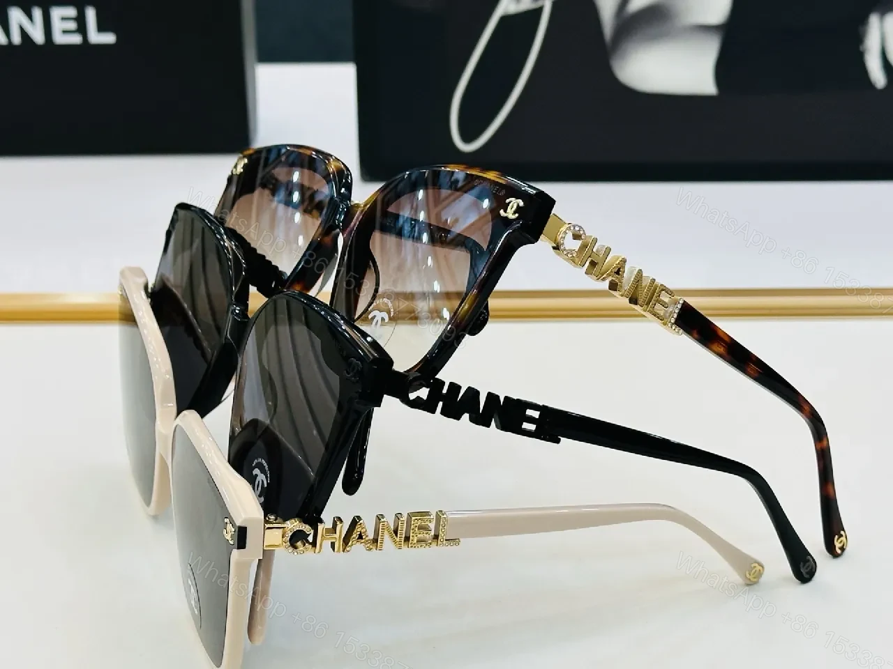 View 6 of Bold Black Frame Sunglasses with Gold Detailing