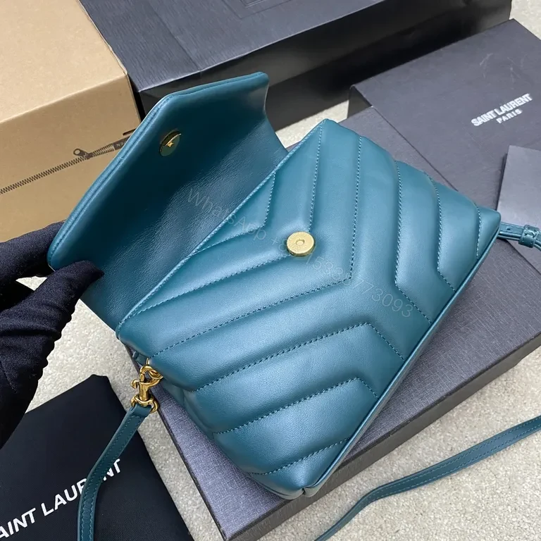 View 3 of Teal Quilted Flap Bag with Gold YSL Accent - Compact Luxury