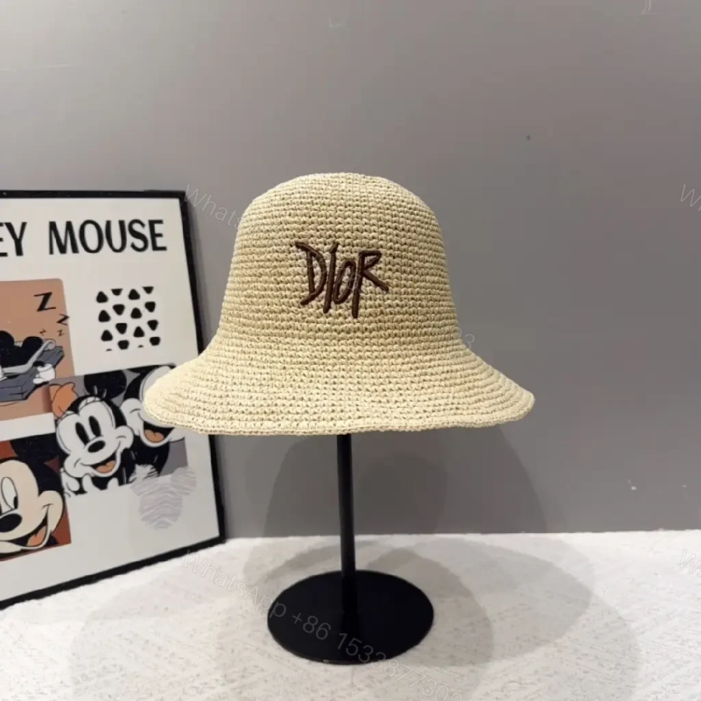 View 2 of Chic Straw Bucket Hat – Embroidered Logo, Breathable Style