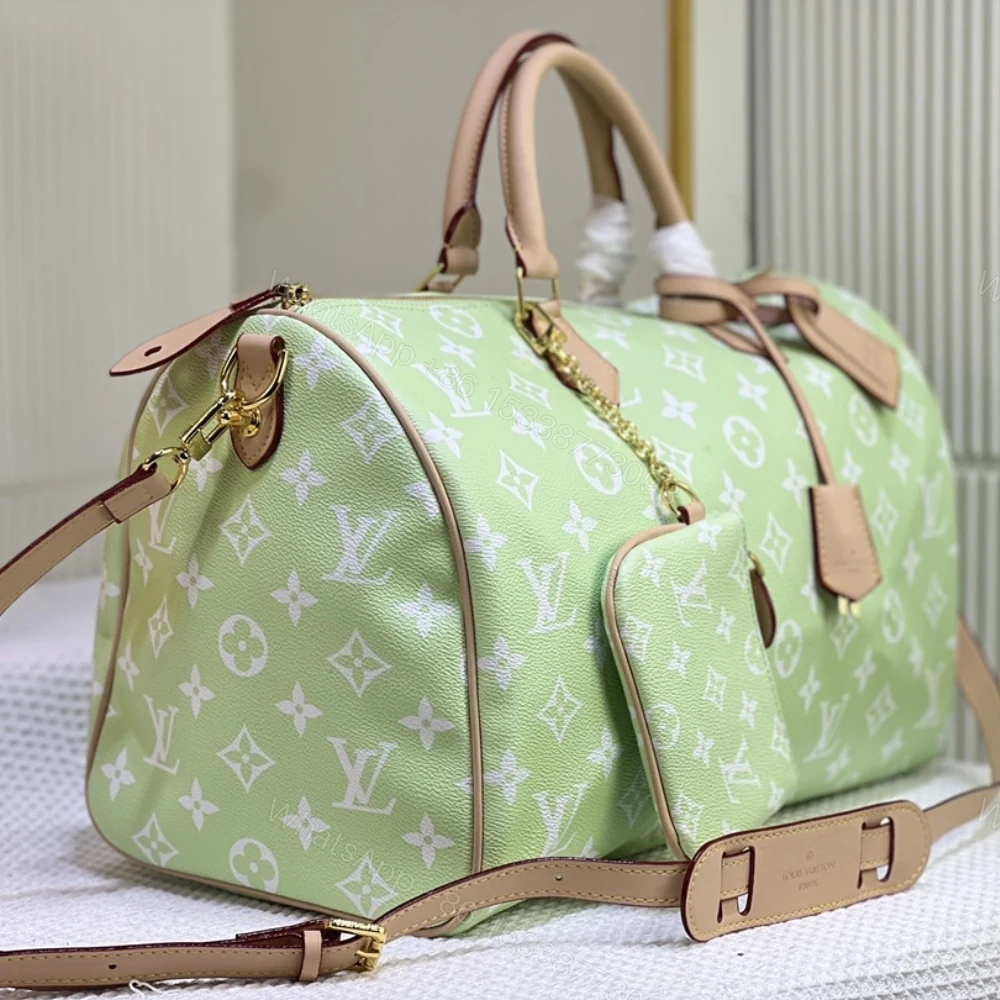 View 2 of Louis Vuitton Speedy P9 Bandoulière 25 Mint 40Cm