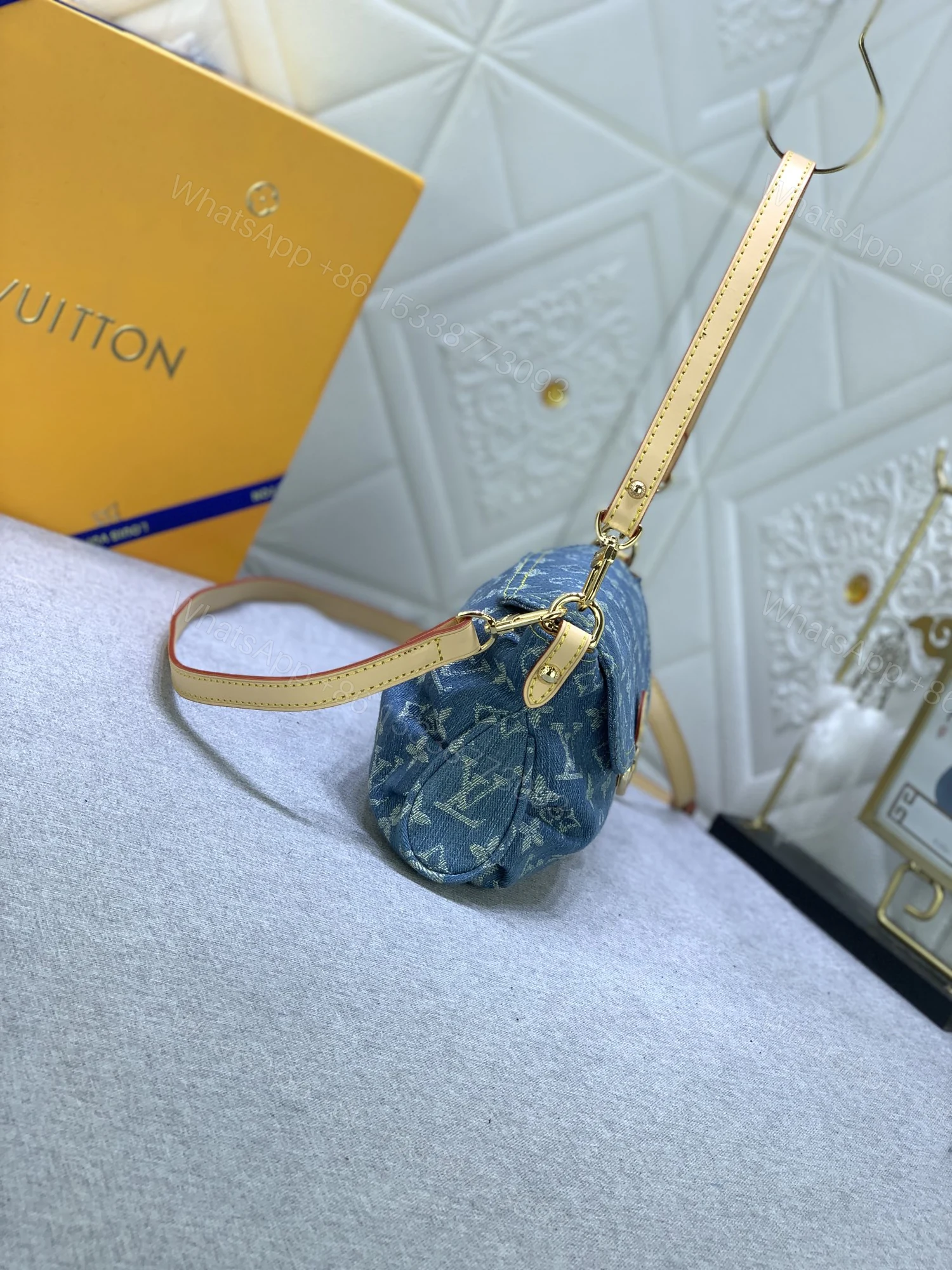 Louis Vuitton Pleaty bag in blue denim — view 2