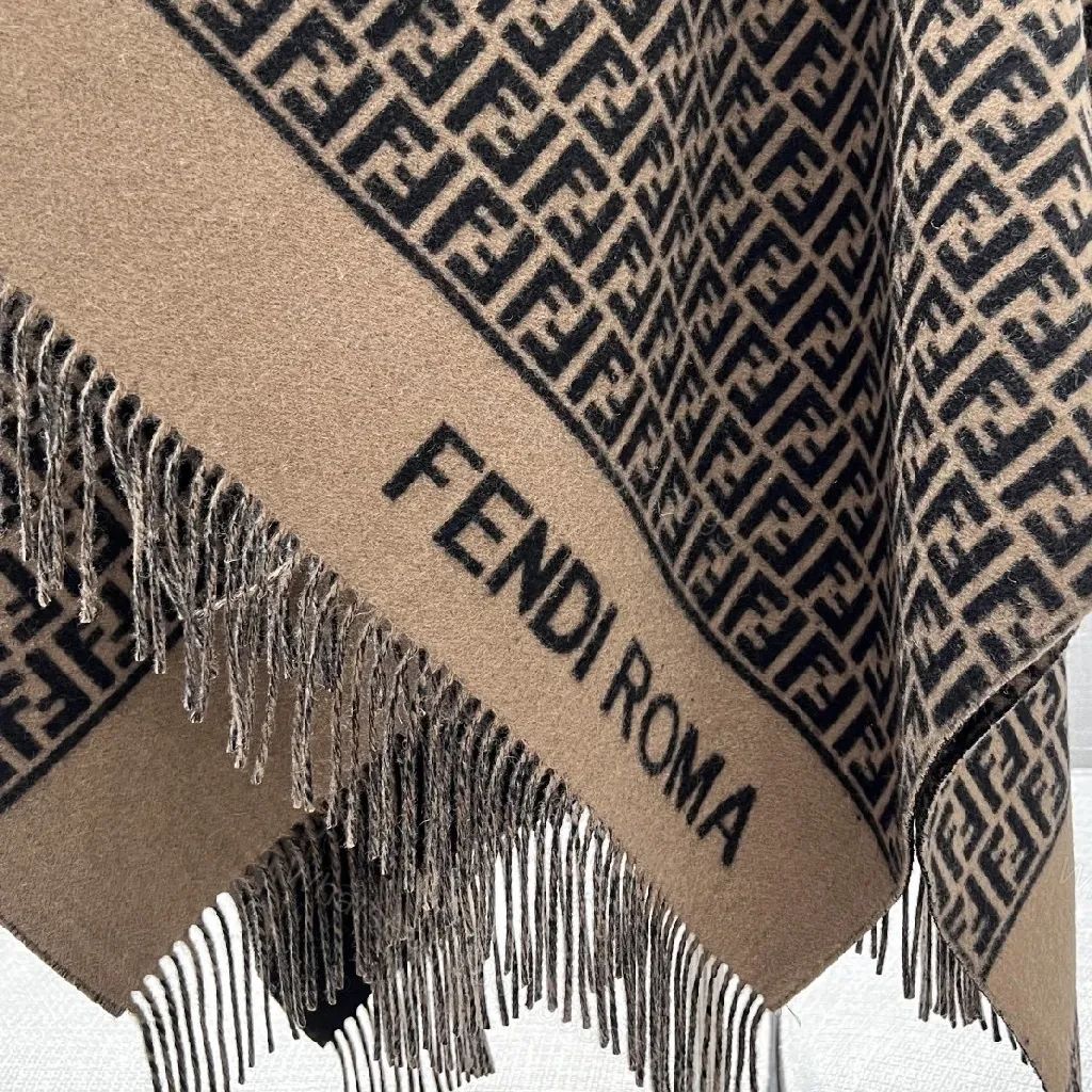 View 7 of Neutral Knit Poncho: Luxe Monogram-Patterned, Fringed, All-Season