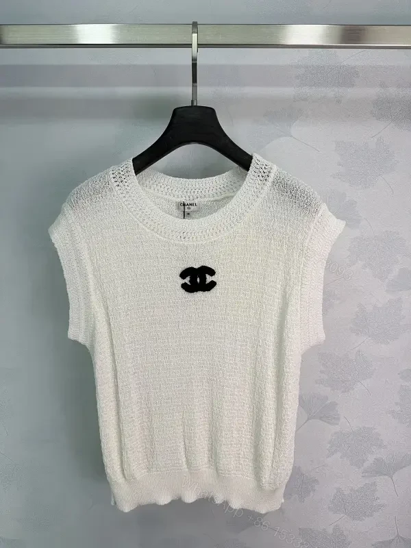 White boucle knit relaxed-fit sweater with Chanel logo — view 1