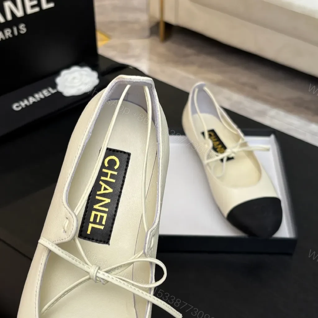 View 5 of Ivory Leather Ballet Flats with Black Cap Toe, Lace-Up, Elegant