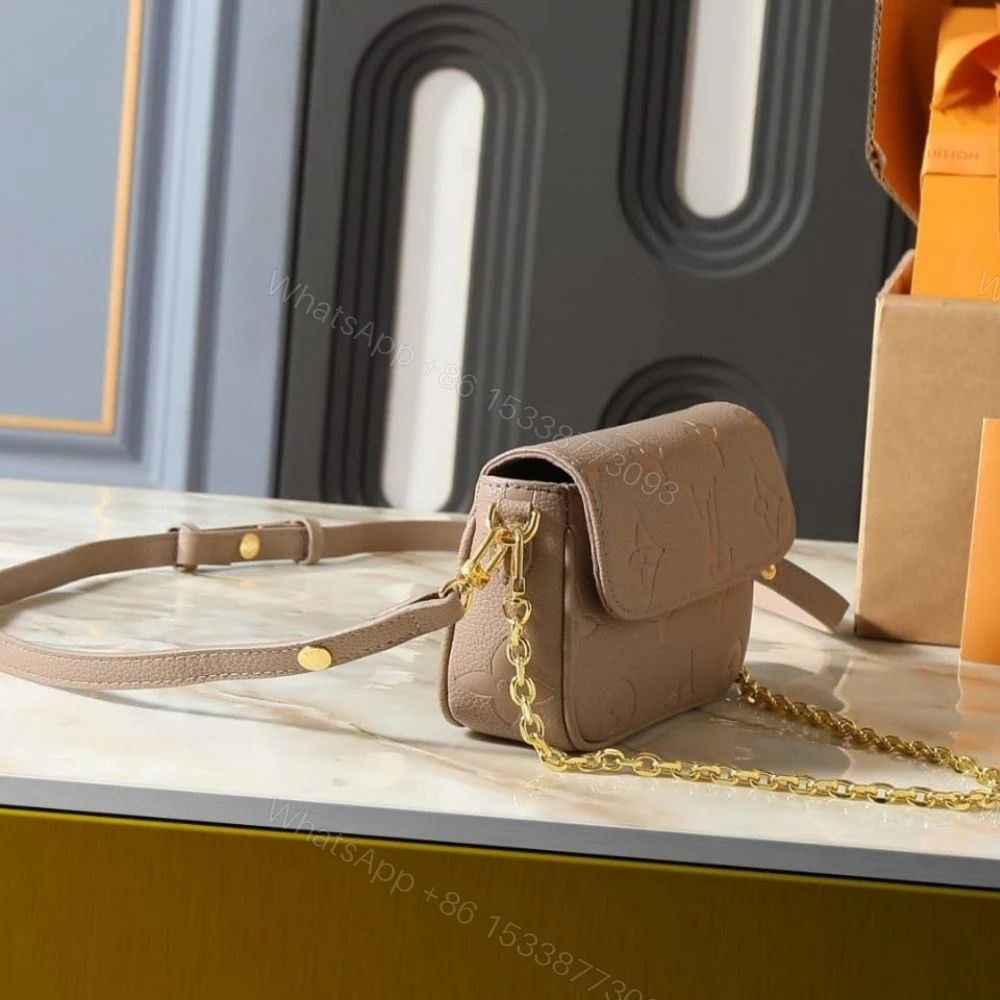 View 3 of Louis Vuitton Wallet On Chain Ivy Monogram Empreinte Greige 23Cm