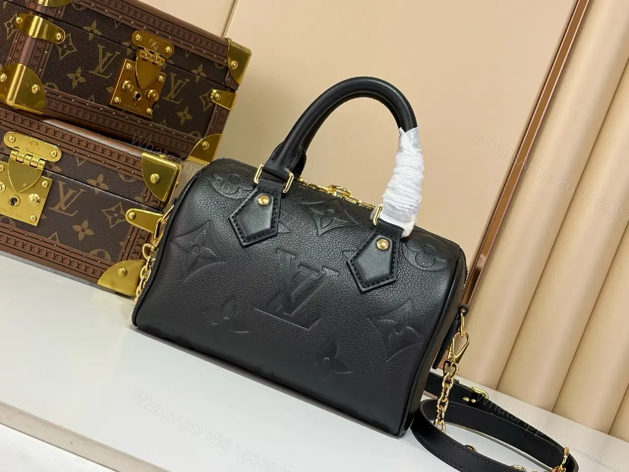 View 4 of Black Pebbled Leather Dome Handbag with Gold Details