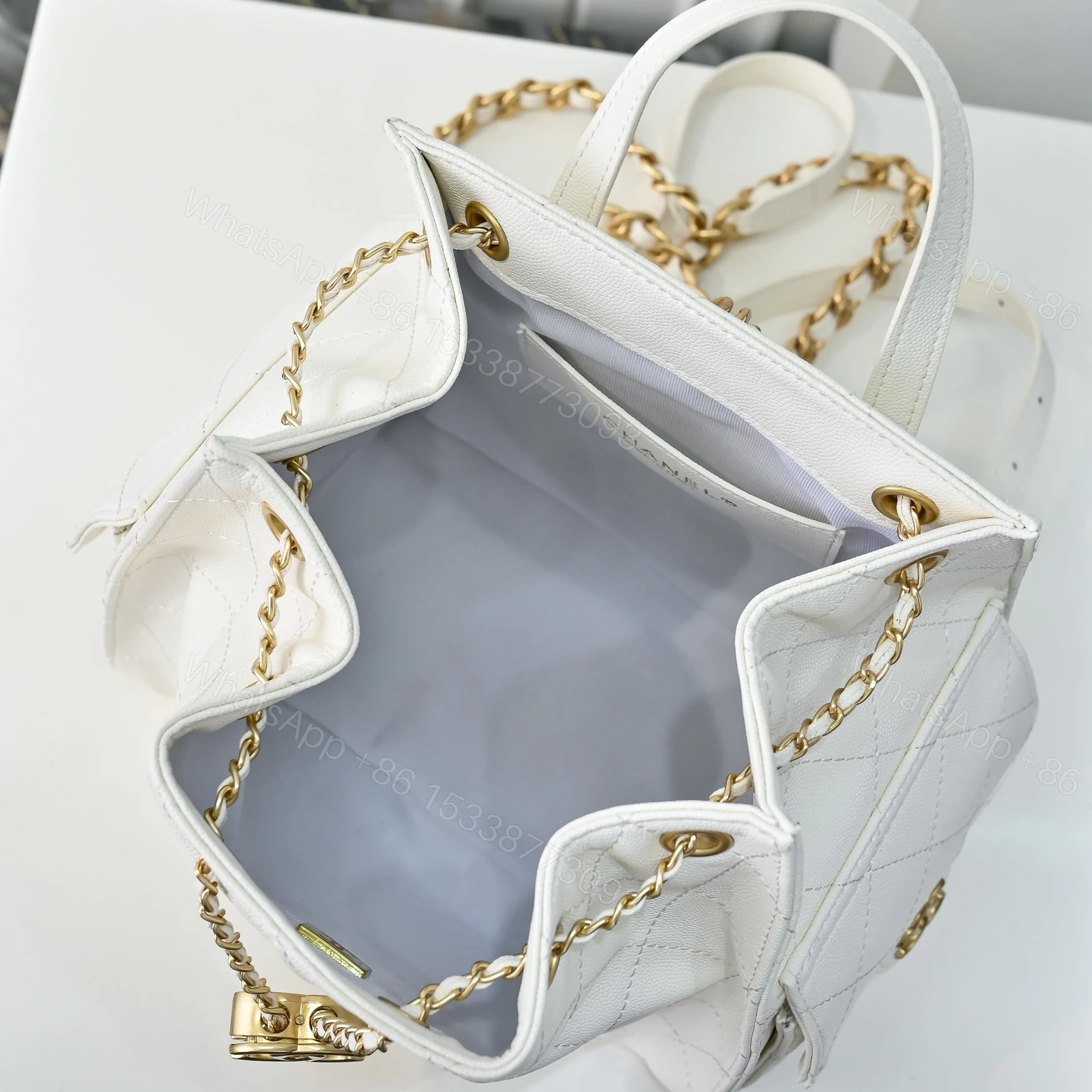 View 8 of Chanel 25 Medium Size Backpack Grain Effect And Gold Metal White 23Cm As5600 B20304 10601