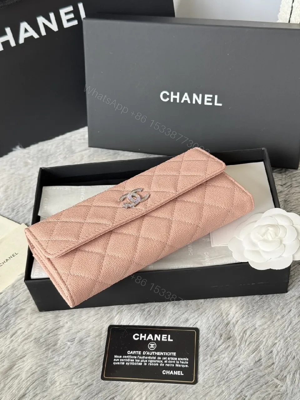 View 2 of Soft Pink Quilted Wallet with Silver Emblem - Compact Luxury Wallet