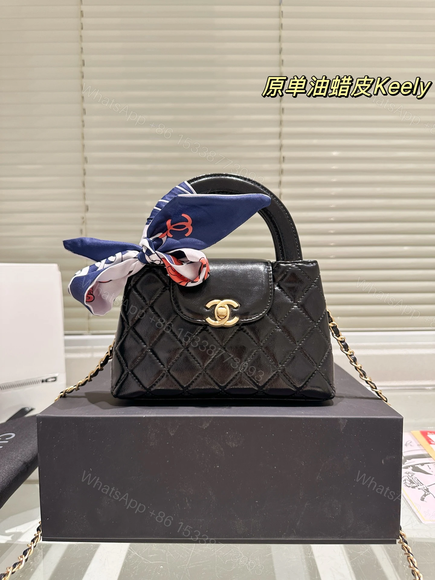 CHANEL A貨黑色菱格手提蝴蝶結小方包 油蠟皮鏈條優雅款 — view 1