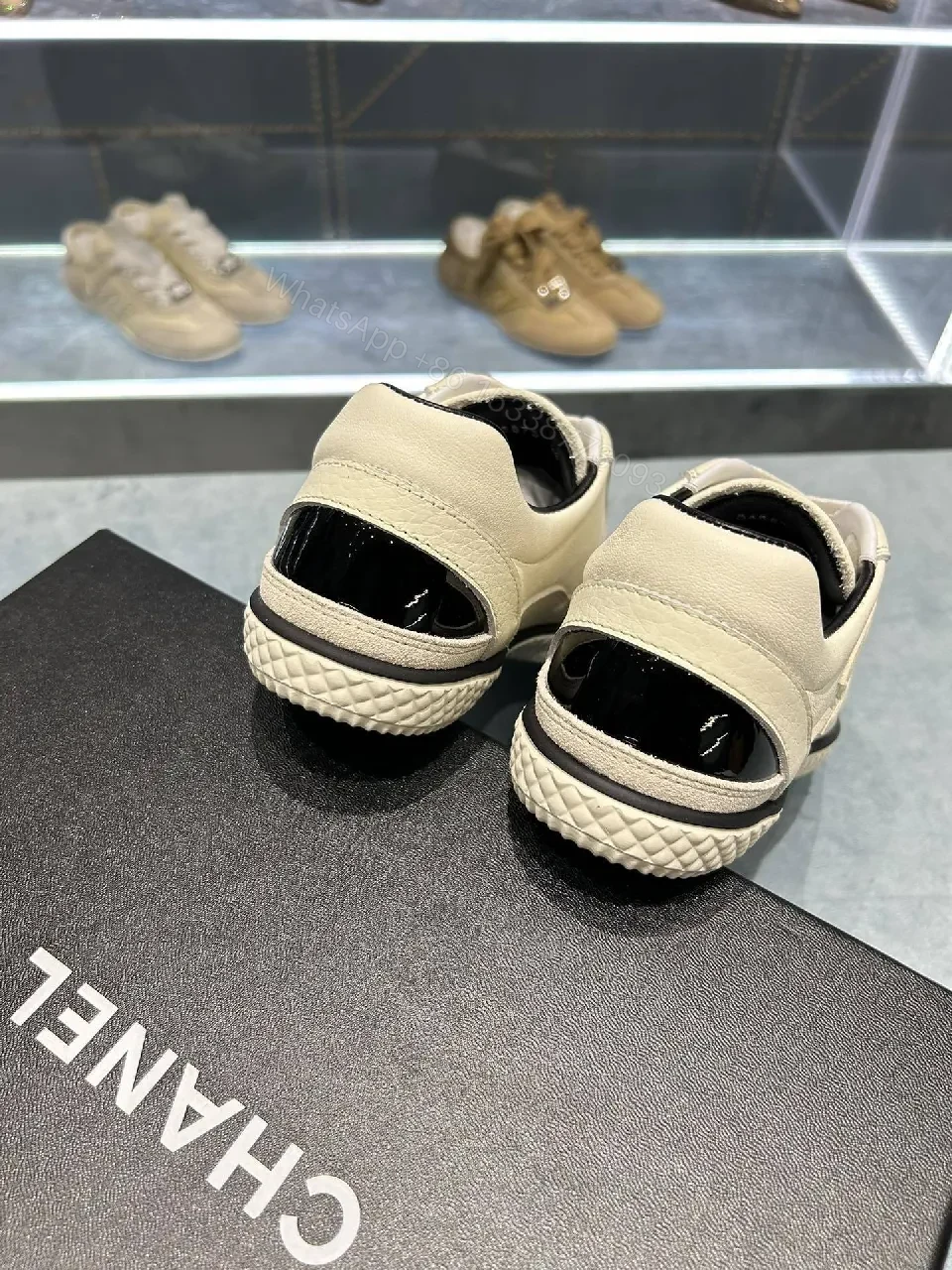 View 7 of Cream Leather Sneaker + Subtle Chanel-Inspired Detail + High-Top Comfort + Timeless Glossy Toe + Sneaker