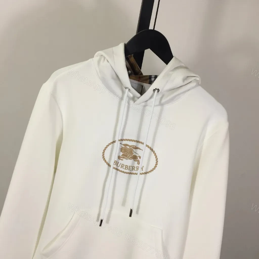 View 3 of Neutral Off-White Luxury Hoodie with Crest Embroidery