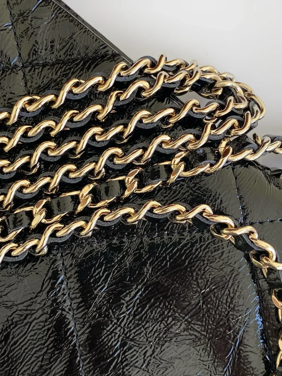 View 3 of Black Quilted Crossbody Bag with Gold Chain