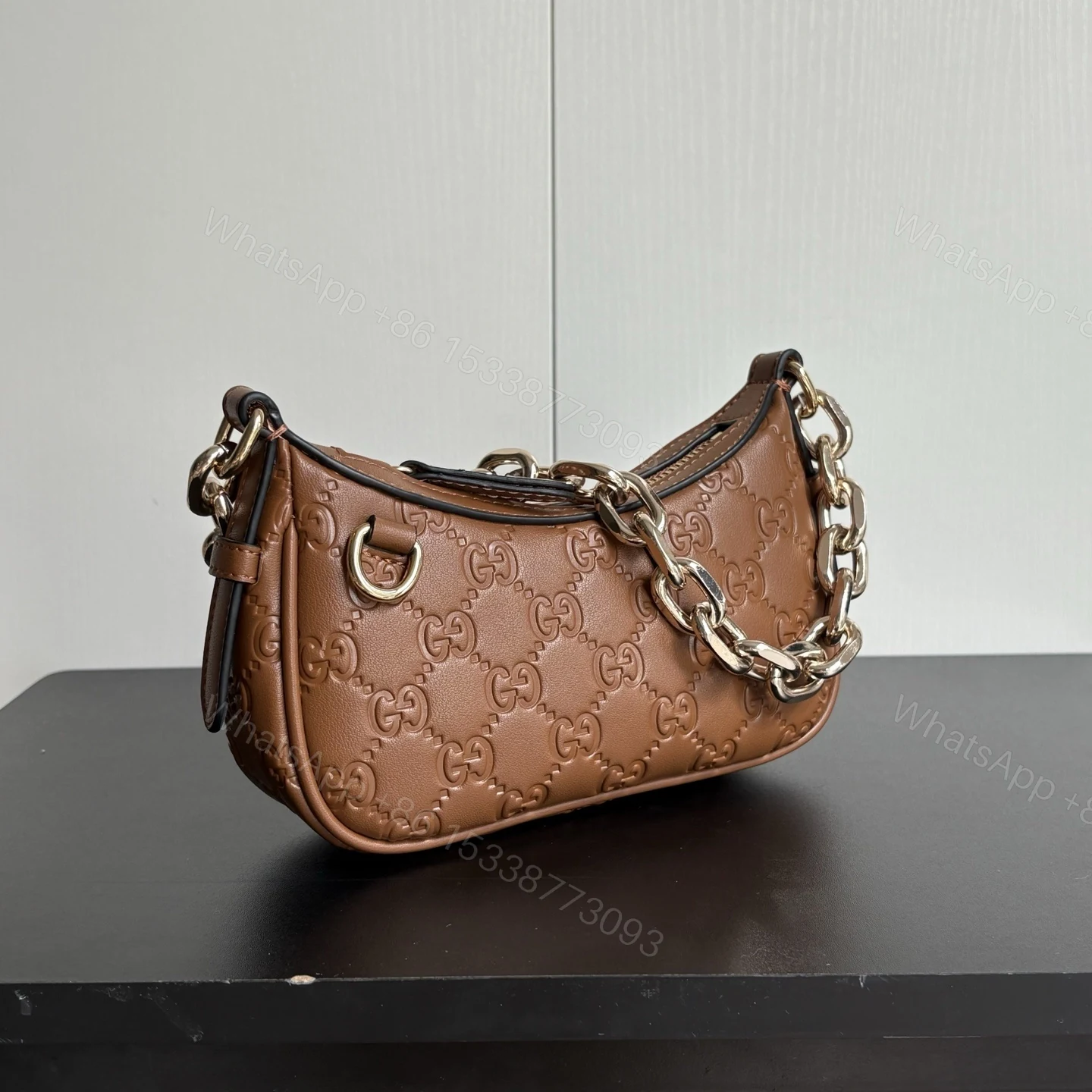 View 3 of Gucci Gg Emblem Mini Shoulder Bag In Brown Gg Embossed 19Cm