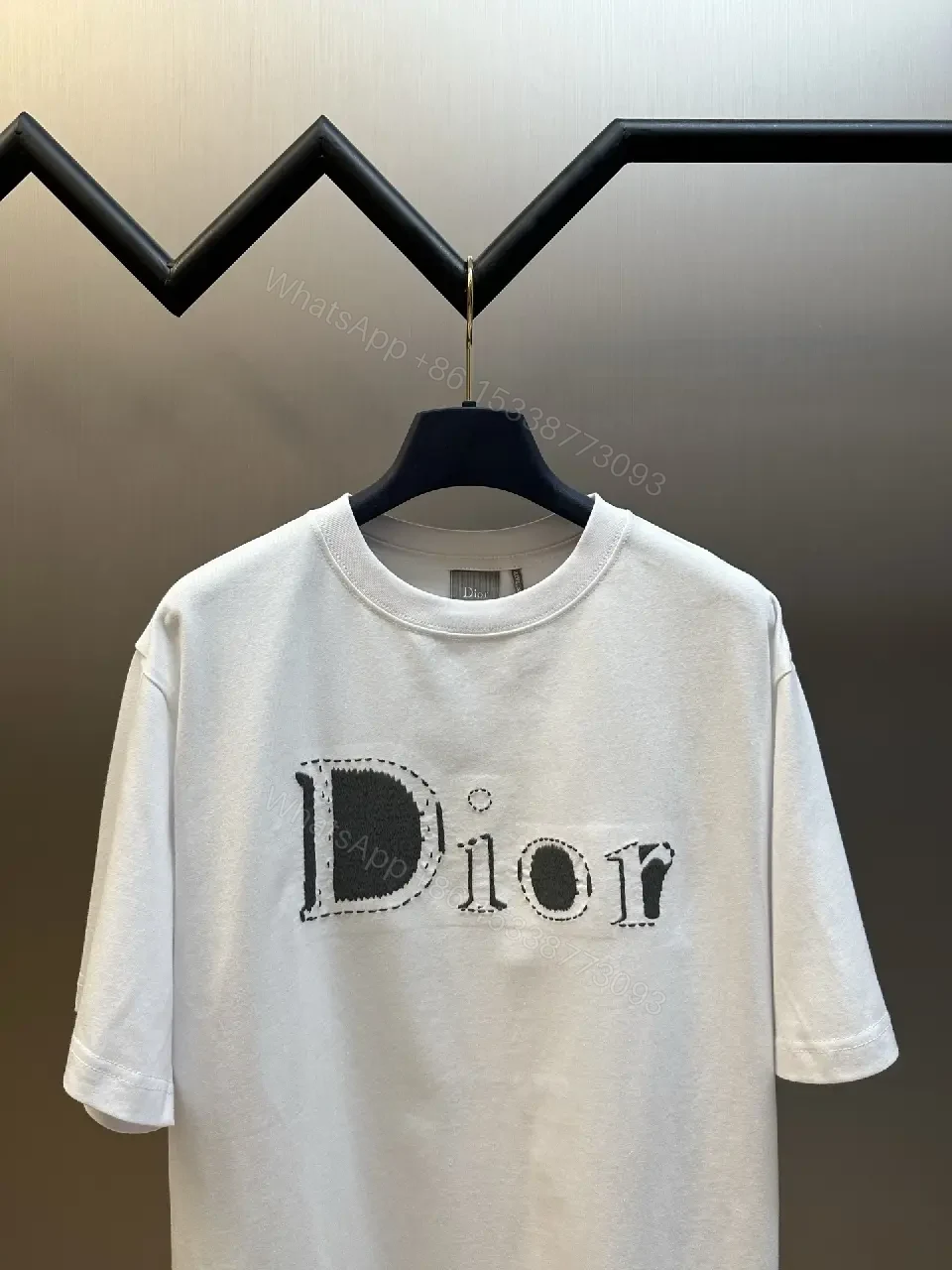 View 8 of Minimalist White Logo Tee - Premium Cotton, Modern Fit, Graphic Accent