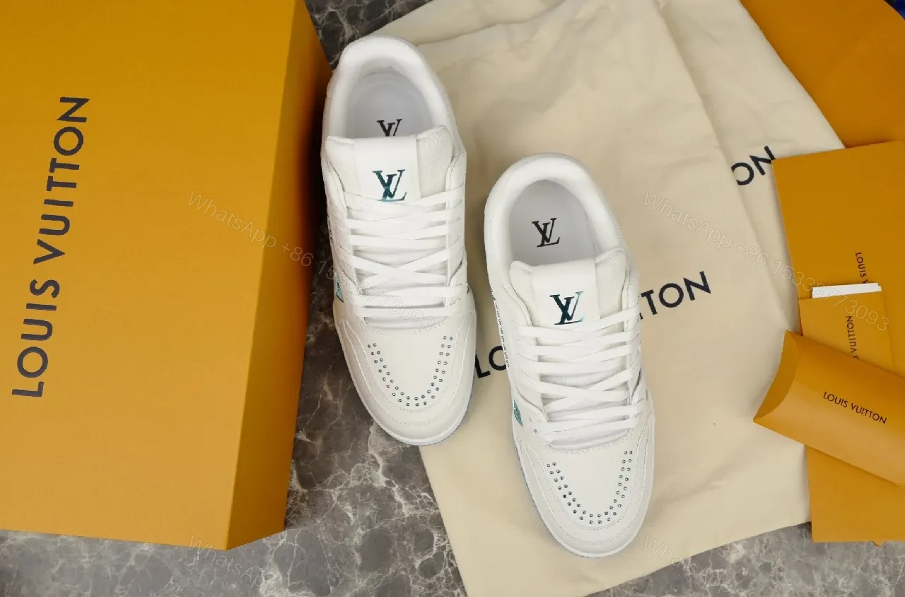View 2 of White Leather Luxury Sneakers with Subtle LV Accents