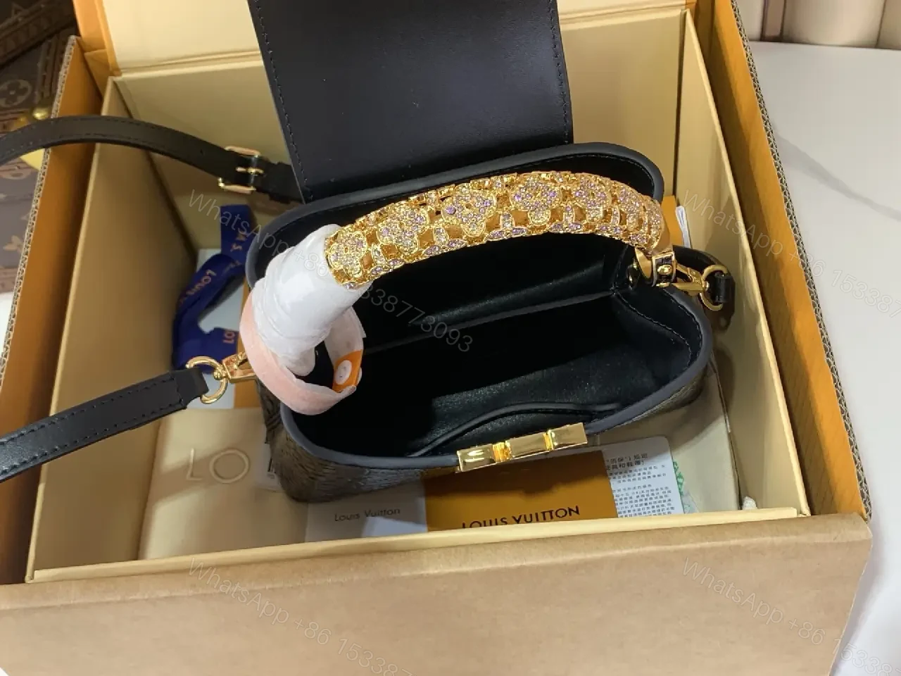 View 7 of Chic Black Crocodile-Embossed Mini Handbag with Gold Hardware
