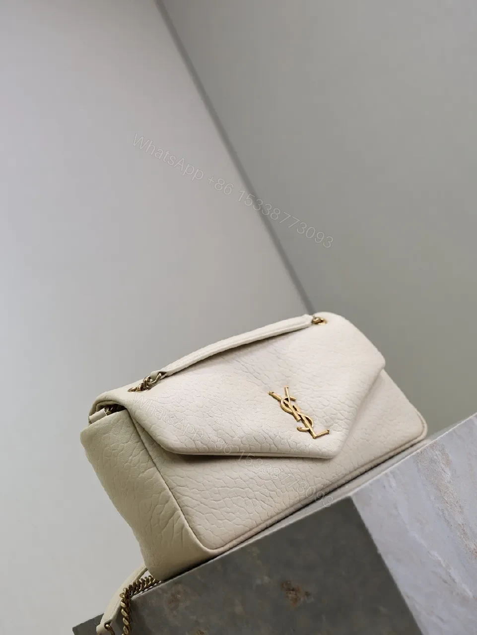 View 4 of Ivory Pebbled Leather Chic Handbag with Gold Hardware